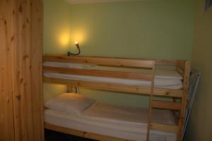 a couple of bunk beds in a room at Werder Anke in Rettin