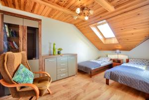 Posteľ alebo postele v izbe v ubytovaní Apartament przy Walowej