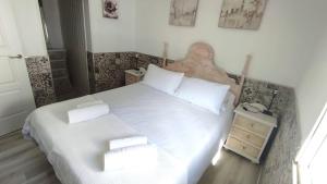 Postel nebo postele na pokoji v ubytování VillaConil + 37 fotografií