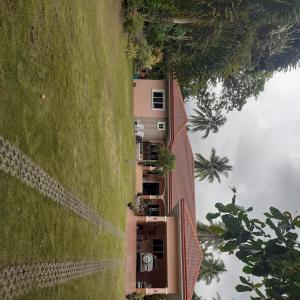 Kuvagallerian kuva majoituspaikasta Villa Estela guesthouse, joka sijaitsee kohteessa Bacong