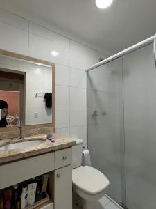 Ένα μπάνιο στο Apartamento 2 dorm. em Bombas SC