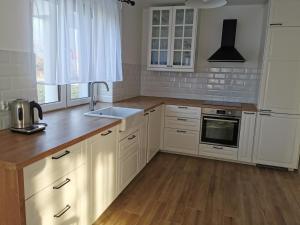 Kuchyň nebo kuchyňský kout v ubytování Hygge House
