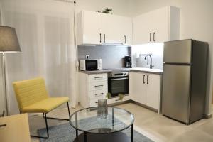 A kitchen or kitchenette at Aelia Apartment 2 Ioannina