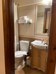 Koupelna v ubytování Valentini Guesthouse + 37 fotografií