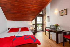 Posteľ alebo postele v izbe v ubytovaní Hotel Beskid