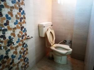 Ένα μπάνιο στο Hotel Shiv Regency