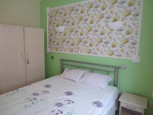 Postel nebo postele na pokoji v ubytování Apsara Villas