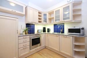 Kuchyň nebo kuchyňský kout v ubytování Tallinn City Apartments Roosikrantsi