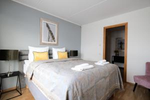 Postel nebo postele na pokoji v ubytování Tallinn City Apartments Roosikrantsi