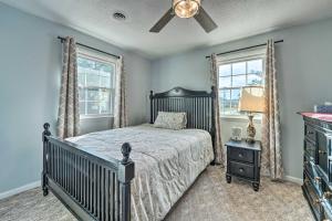 A bed or beds in a room at Jacksonville Getaway about 4 Mi to Downtown!