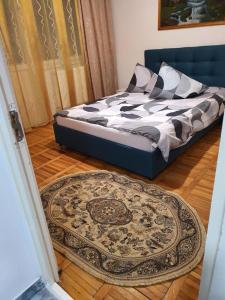 Postel nebo postele na pokoji v ubytování RazDav Straja Central