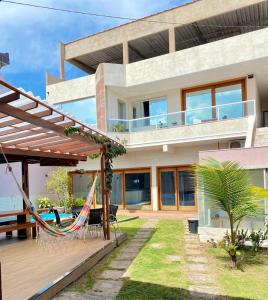 Κήπος έξω από το Casa temporada com piscina +24 φωτογραφίες