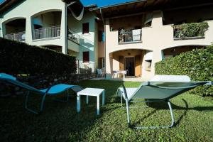 Sodas prie apgyvendinimo įstaigos Oliva Apartment - Featuring a Private Garden and Access to a Pool