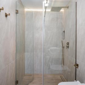 Koupelna v ubytování Le Premier Luxury Rooms