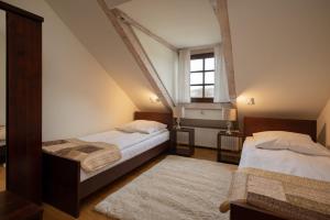 Posteľ alebo postele v izbe v ubytovaní Hotel Beskid