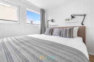 Schwimmendes Haus Hygge Olpenitz客房内的一张或多张床位