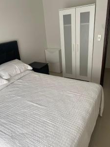 Letto o letti in una camera di España Suites Hotel