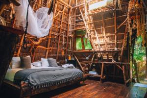 Postel nebo postele na pokoji v ubytování Ikal Tulum Hotel