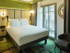 Posteľ alebo postele v izbe v ubytovaní Mercure Hôtel Le Touquet
