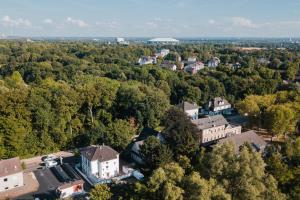 an aerial view of a town with trees and buildings at Buer Appartment in Gelsenkirchen