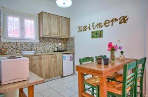 A kitchen or kitchenette at Maro Apartments Arillas Corfu