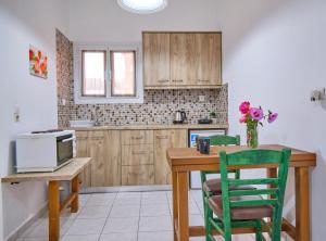 A kitchen or kitchenette at Maro Apartments Arillas Corfu