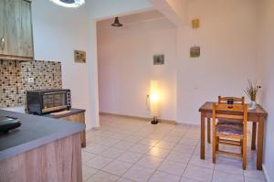 A kitchen or kitchenette at Maro Apartments Arillas Corfu