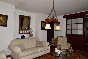 Posezení v ubytování Condominio Hacienda Shangrila