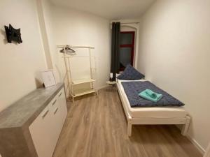 Cama ou camas em um quarto em modernes cozy Apartment