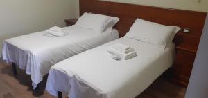 A bed or beds in a room at Casale Sienti'n Può