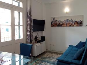 TV a/nebo společenská místnost v ubytování Machico Centre Comfort