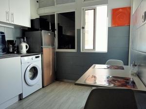 Kuchyň nebo kuchyňský kout v ubytování Machico Centre Comfort
