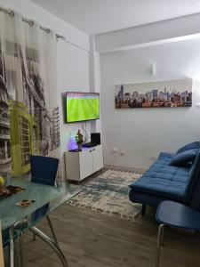 TV a/nebo společenská místnost v ubytování Machico Centre Comfort