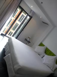 Posteľ alebo postele v izbe v ubytovaní Mayerling Hotel