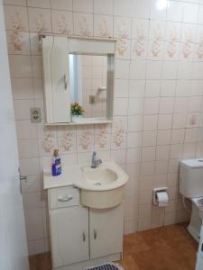 Kylpyhuone majoituspaikassa Apto em Santa Maria