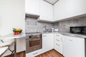 Kuchyňa alebo kuchynka v ubytovaní Apartament Sobieskiego 2 Parking gratiss
