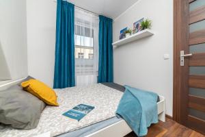 Posteľ alebo postele v izbe v ubytovaní Apartament Sobieskiego 2 Parking gratiss