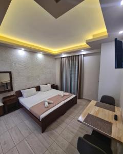 Postel nebo postele na pokoji v ubytování Abella Hotel