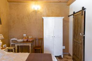A bed or beds in a room at Aria di Bosco