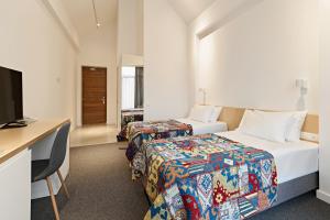 Postel nebo postele na pokoji v ubytování Dilijani Tun Hotel & Restaurant + 37 fotografií