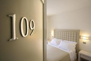 Postel nebo postele na pokoji v ubytování Hotel Alta La Vista