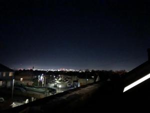 a view of a marina at night at 1 bedroom flat Oakfield Road in Bristol