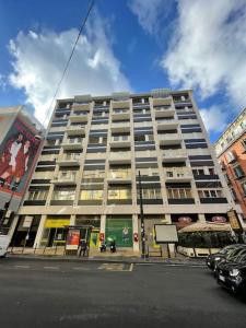 a large apartment building on a city street at [Chiaia] Arcoleo House - Anita in Naples