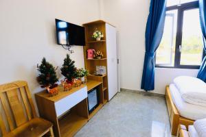 TV a/nebo společenská místnost v ubytování Lan Mạnh Hotel