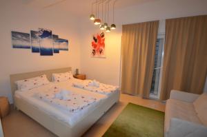 Ліжко або ліжка в номері Am Schlosspark - App Seestern