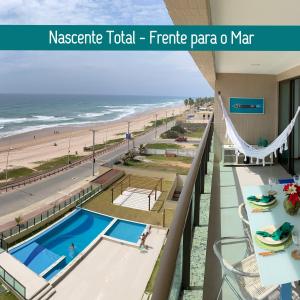 a view of the beach from the balcony of a hotel at Salvador - Praia do Flamengo - Pé na areia in Salvador