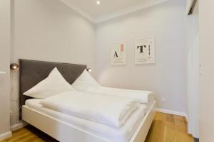 Postel nebo postele na pokoji v ubytování Soltausche Buchdruckerei - Whg 02