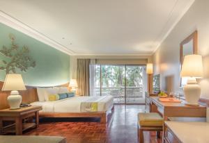 Postel nebo postele na pokoji v ubytování The Regent Cha Am Beach Resort, Hua Hin