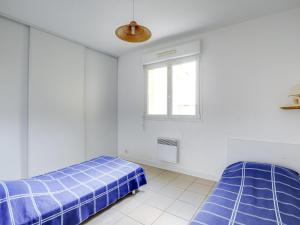 En eller flere senger på et rom på Appartement Biscarrosse Plage, 4 pièces, 6 personnes - FR-1-521-12