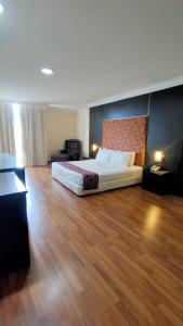 Postel nebo postele na pokoji v ubytování The Jerai Hotel Sungai Petani